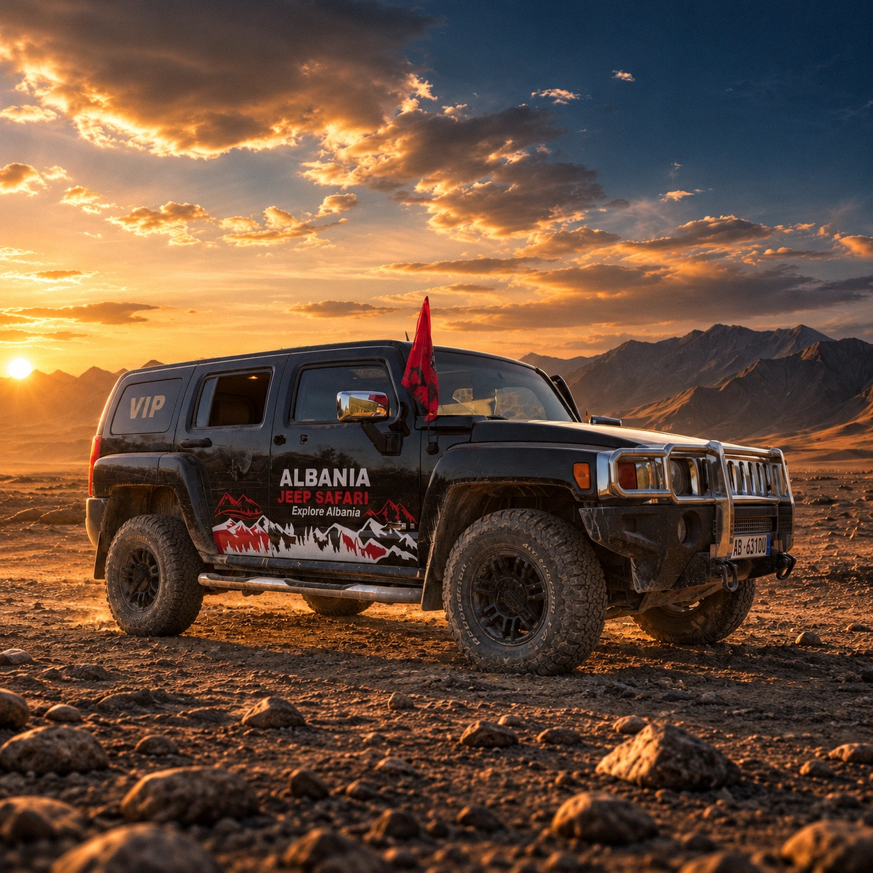 Black Hummer H3 VIP in Albania Jeep Safari livery, flag flying, on a rocky plain at sunset